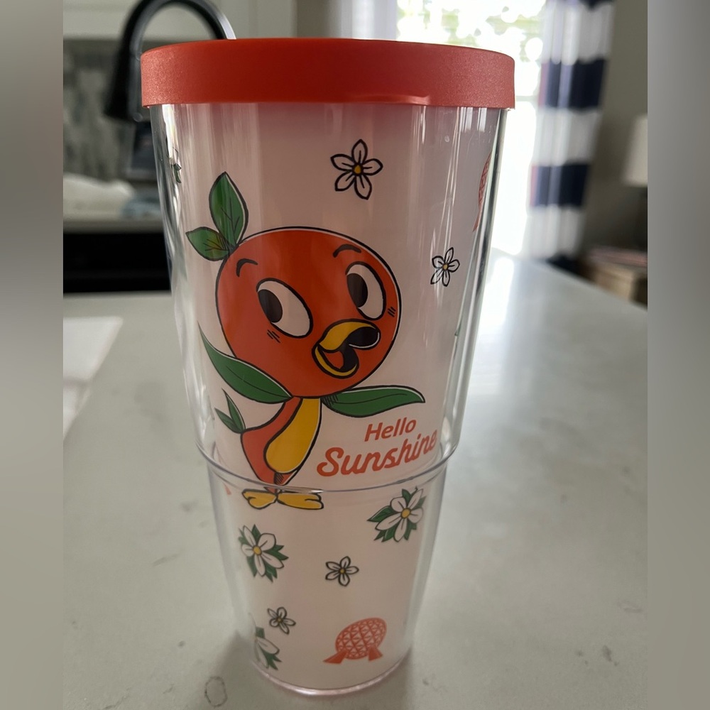 Disney Orange Bird 32 oz Tervis cup with lid and 10 oz ceramic cup.